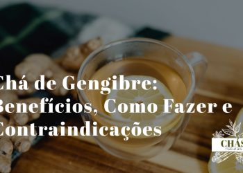 chá de gengibre benefícios — chávena com chá de gengibre fresco em fundo rústico
