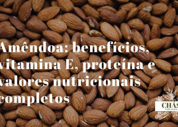 benefícios da amêndoa — amêndoas cruas com película castanha sobre superfície de madeira rústica