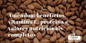 benefícios da amêndoa — amêndoas cruas com película castanha sobre superfície de madeira rústica