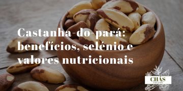 benefícios da castanha-do-pará — castanhas grandes triangulares com casca escura sobre fundo de madeira